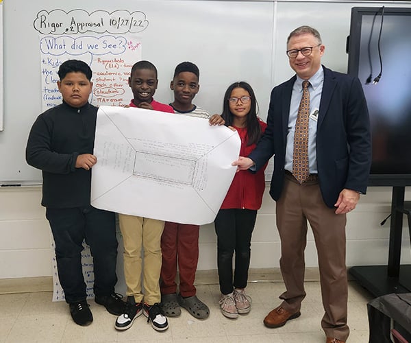 Michael with students